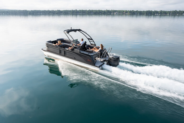 Qwest Pontoons M-Class RLS shown in the Limited black and red package features comfortable benches in all 4 corners and an open center walkway for relaxing in comfort.