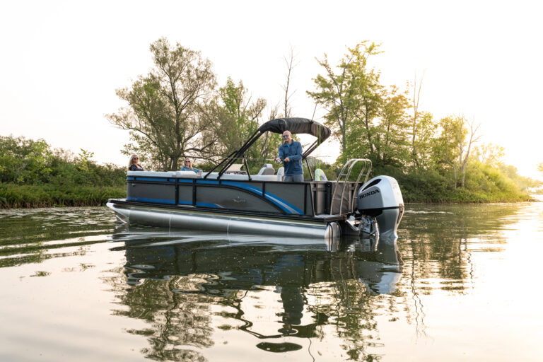 Qwest Pontoons E-Class XRE Cruise model features comfortable bench seating in the bow and rear fishing seats with fish station.