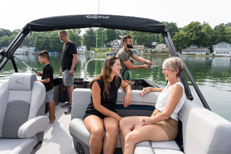 Qwest Pontoons Pro Family Fish with spacious back deck for fishing and front benches for lounging in comfort.